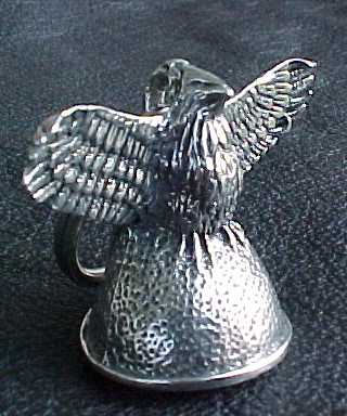[Standing Eagle Bell]